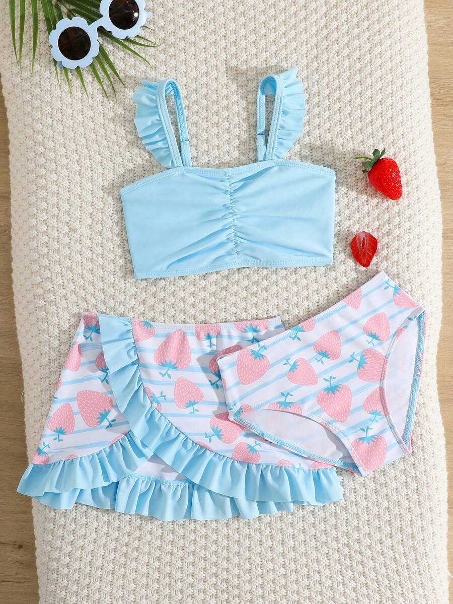 SHEIN 4pcs/Set Girls (Small) Swimsuit Set, Spring/Summer Beach Swimwear Set, New Arrival. Includes Spaghetti Strap Swimsuit Top, Bottoms, Cover-Up Skirt, And Sun Hat. Adorable Strawberry Pattern Makes Girls Cuter, Ruffled Hem Adds Sweet And Lovely Touch. Strawberry Pattern Is Very Cute. 3 Piece Bikini Set Strawberry Print Bikini With Skirt Ruffled Bikini Top And Skirt Girls Two Piece Swimwear Young Girl 3 Piece Swim Suit - Baby Blue - View 1