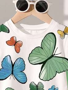 Baby Girls Cute Floral Print Fashion Round Neck Short Sleeve T-Shirt And Shorts Set, Suitable For Parties And Gatherings. Butterfly Print Round Neck T-Shirt Paired With Green Shorts, Butterfly Pattern Design, Lightweight And Comfortable For Spring/Summer. Fashionable Casual Outfit, Suitable For Street, Outdoor, Picnic, School, Holidays, And Gifts.