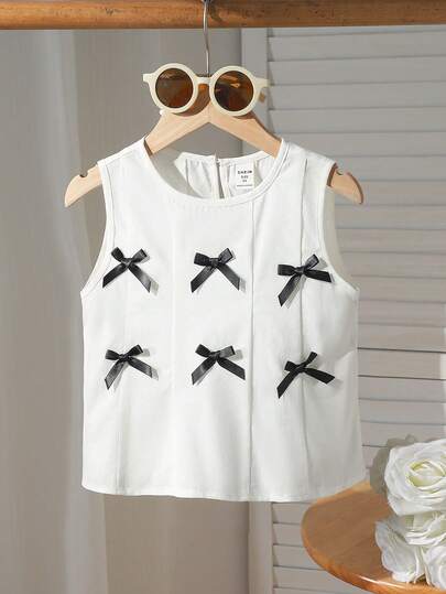 SHEIN Camiseta de tirantes con cuello redondo y decoración de lazo de unicolor tejido para niña
