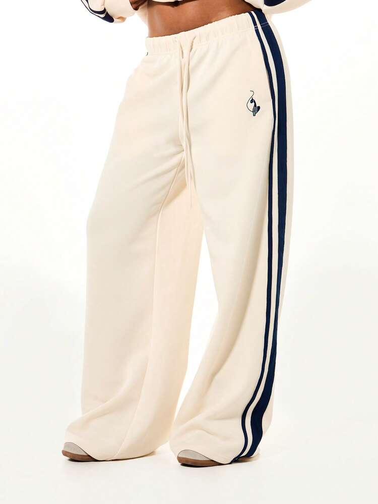 BABYPHAT Pantalon de survêtement ample à jambes larges avec logo tricoté, rayure latérale, taille à cordon de serrage, coupe ample et confortable, chevilles élastiques. Pantalon de jogging Y2K pour femmes, couleur crème.