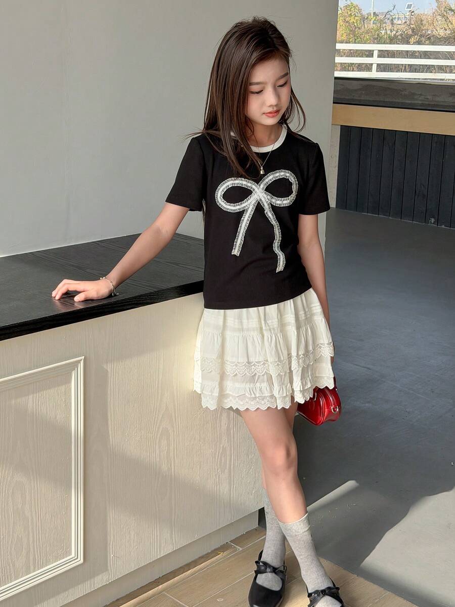 DAZY Camiseta de manga corta con cuello redondo, lazo decorativo y tejido para niñas preadolescentes, otoño - Negro - Ver 1