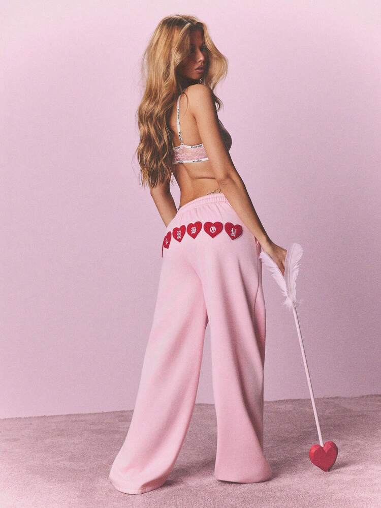 Missguided x Playboy Pantalon de jogging à jambes larges avec appliqué en forme de cœur, taille avec cordon de serrage et poches latérales pour un confort casual