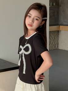 DAZY Camiseta de manga corta con cuello redondo, lazo decorativo y tejido para niñas preadolescentes, otoño - Negro - Ver 6