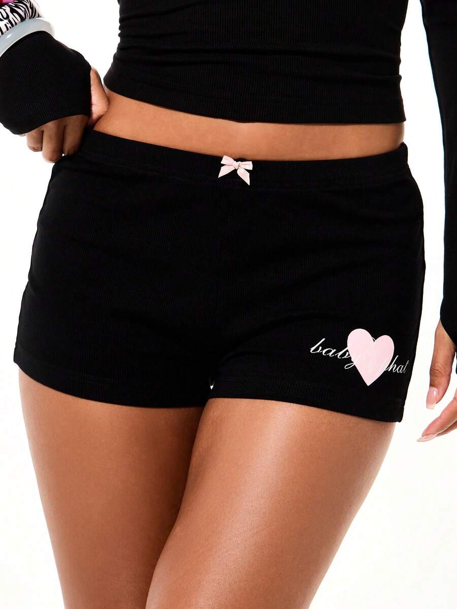 BABYPHAT Shorts acanalados de tiro alto con estampado de corazón rosa y detalle de lazo en la cintura. Shorts de verano mini ajustados y lindos para el Día de San Valentín - Negro - Ver 1