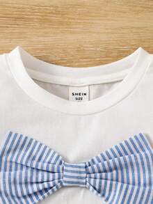 SHEIN Camiseta casual feminina de gola redonda com laço 3D em patchwork de cor sólida e contraste. - Branco - Ver 7