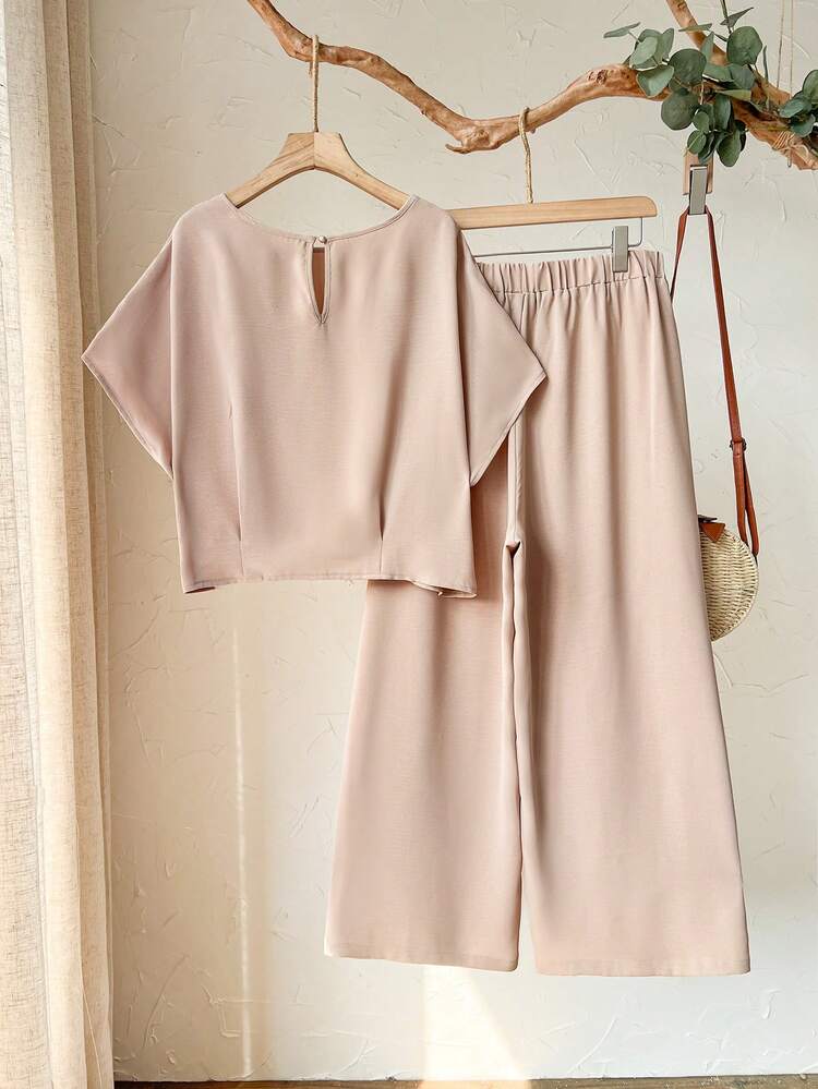 Plus Size Women's Spring/Summer  Casual Vacation Round Neck Short Sleeve Solid Color Cropped Top And Pants 2-Piece Set ,Nude Two Piece Set Two Piece Set ,Women Comfy Modest Two Piece Set ,Beige Two Piece Set, Comfortable Two Piece Set,Early Spring,Spring Break Outfits ,Vacation Outfits Women ,Holiday Outfits For Women,Spring Clothes Women,Going Out Outfits,2026 New Clothes,Simple And Fashionable For Everyday Wear, Two Piece Set Women Comfy