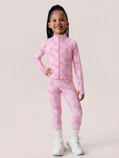 This Cute Pink Printed Jacket And Pants Set For Young Girlis Made From Soft, Stretchy Fabric For All-Day Comfort. Perfect For Playgrounds, Outings, And Casual Wear, It's A Stylish And Practical Choice For Active Young Girl Throughout The Year.