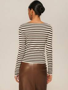 ATUI Studio Top en maille minimaliste à rayures pour femme, épaules dénudées, manches longues, style décontracté.