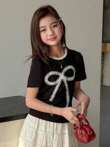 DAZY Camiseta de manga corta con cuello redondo, lazo decorativo y tejido para niñas preadolescentes, otoño - Negro - Ver 4