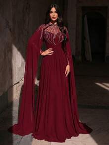 Aureia Đầm maxi dáng chữ A dài tay, cổ đứng, chất liệu vải voan mỏng, màu đỏ tía sang trọng và thanh lịch, được trang trí cầu kỳ bằng đá quý và hạt cườm, ôm sát eo, thích hợp cho các dịp trang trọng và dạ hội. - Màu Đỏ Sâu - Xem 6