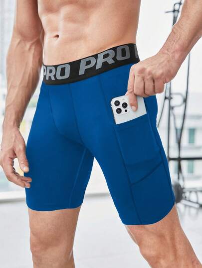 Manfinity Sport Corelite 男士撞色字母织带腰部拼接口袋塑身运动短裤