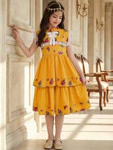 SHEIN Robe ample en tissu tressé à manches bouffantes avec nœud papillon, style casual blocs de couleurs pour préadolescentes. Robe mini simple et décontractée en couleur unie, idéale pour le printemps/été. Manches courtes bouffantes avec nœud papillon contrastant au centre. Robe babydoll courte, robes d'été pour femmes - Kaki - Voir 2