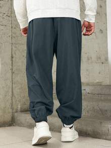 Manfinity Homme Pantalones casuales de unicolor con cordón para hombres de talla grande, pantalones holgados, pantalones de chándal holgados para hombres - Azul - Ver 2