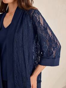 Miaspire This Elegant Two-Piece Women's Set Features A Deep Navy Blue Base, With The Combination Of Lace Texture And Matte Fabric Exuding A Touch Of Understated Luxury. The Floral Pattern Is A Delicate, Subtle Lace Design, Revealing A Gentle And Refined Temperament In Its Understated Details. The Silhouette Consists Of A Loose-Fitting Lace Cardigan And A Fitted V-Neck Vest. The Lightweight Fabric Is Versatile Enough For Various Occasions, And The Layering Design Balances Warmth And Style.Suitable For Spring And Autumn, And Suitable For Commuting, Casual Gatherings, Or Relaxing Afternoon Tea, This Set Conveys A Composed Style With Its Navy Blue Base And Showcases Elegant Fashion Sense With Its Lace Details. It's A Versatile And Stylish Choice For Any Two-Season Wardrobe. - Navy Blue - View 3