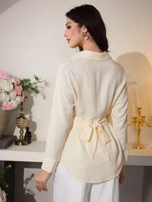 Modelyn Elegant Apricot Plain Long Sleeve Button Front Shirt With Flared Hem For Women Women's Spring/Summer Apricot Long Sleeve Faux Linen Bamboo Knot Tie Waist A-Line Elegant Blouse  Women's Plain Apricot Long Sleeve Blouse With Shirt Collar And Button Front Details Elegant Women's Apricot Blouse Long Sleeve Shirt Collar Button Front Flared Hem Top - Apricot - View 2