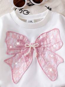 SHEIN Bộ 2 món cho bé gái sơ sinh/trẻ nhỏ: áo thun cổ tròn dệt kim và quần dài có nơ thắt lưng dệt kim đính sequin hình bướm, trang phục thể thao thời trang, mùa thu/đông. - Hồng - Xem 5