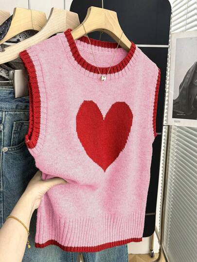 SHEIN Franclia Nuevo chaleco de punto de color avena con contraste de corazón, cuello redondo con ribete rojo, corte holgado oversize, tejido de punto suave, patrón de jacquard de corazón de color contrastante, sin mangas, estilo dulce y juvenil, elemento retro de corazón, casual para capas de primavera, campus, citas, uso diario, artículo versátil, el elemento de corazón agrega vitalidad, contraste de color llamativo, corte holgado favorecedor, vibra relajada de chica coreana suave, se puede usar sobre una camisa para mayor dulzura, combinar con falda plisada para ultra dulce, o jeans para una mezcla dulce y fresca