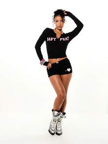 BABYPHAT Shorts acanalados de tiro alto con estampado de corazón rosa y detalle de lazo en la cintura. Shorts de verano mini ajustados y lindos para el Día de San Valentín - Negro - Ver 4