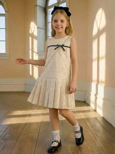 PrepCrw 1件少女优雅都市学院风黑色蝴蝶结装饰白色玫瑰印花无袖宽松连衣裙，适合休闲外出、聚会、节日、派对、秋季、冬季、春季、情人节等场合。女童蝴蝶结连衣裙，象牙色童装，象牙色女童连衣裙，小女孩米色连衣裙，女童连衣裙