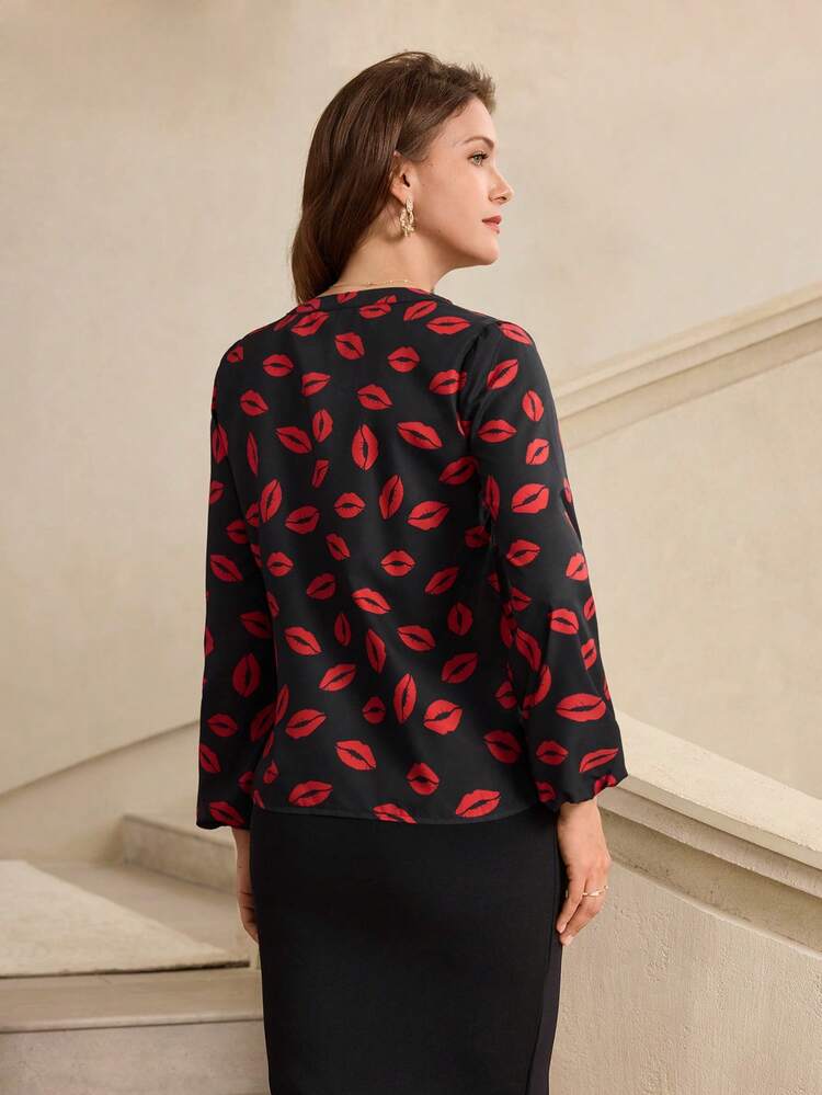 This Elegant Women's Summer Blouse Features A Classic Black Base Adorned With Vibrant Red Lip Prints And Red Lace Trim, A Striking Color-Blocking Design Perfectly Capturing The Romantic Atmosphere Of Valentine's Day. The Playful Red Lip Pattern And Lace Embellishments Add A Touch Of Sweet And Cool Style. The V-Neck Long Sleeves And Relaxed Fit, Along With The Delicate Lace Details, Create A Comfortable Silhouette That Flatters Various Body Types. Suitable For Spring And Autumn, It Can Be Paired With A Black Skirt To Enhance The Valentine's Day Atmosphere, Or Used For Casual Gatherings And Outings. Conveying Romance With The Red Lip Element While Showcasing A Fashionable And Eye-Catching Style With Its Color-Blocking Design, This Blouse Is A Versatile And Stylish Choice For Both Seasons.