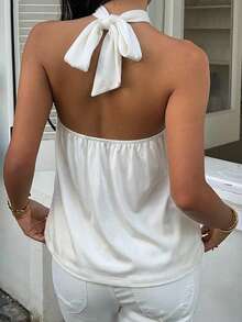 SHEIN EZwear Áo nữ kiểu dáng thường ngày, in họa tiết hoa ly hồng, cổ yếm, hở lưng, thích hợp cho mùa hè, đi biển, lễ hội âm nhạc, đồ bơi thoải mái hoặc trang trí đi biển. - Nhiều màu - Xem 2