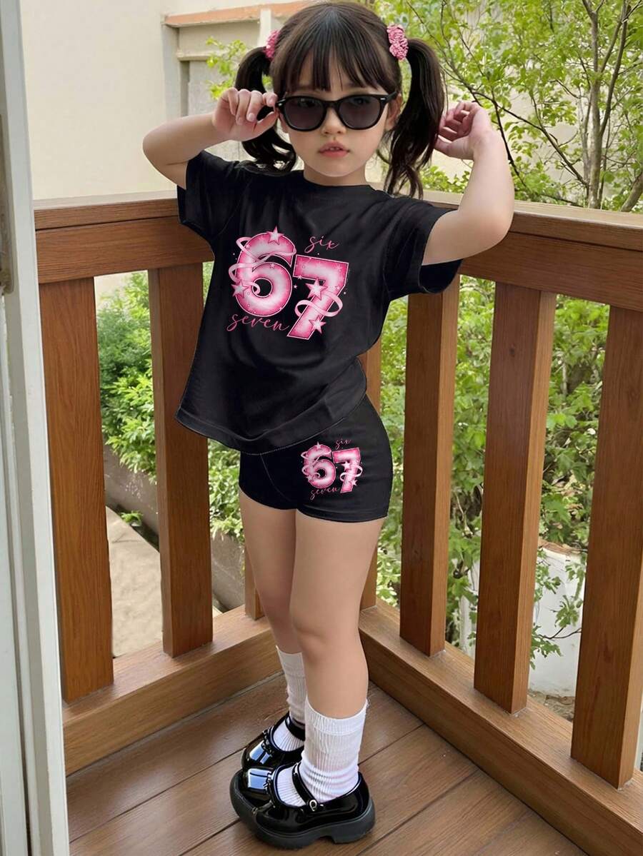 SHEIN 两件套女孩旅行休闲运动风套装，包含一件印有56号图案的短袖T恤和一条骑行短裤，采用撞色袖子和撞色领设计，并印有“每一天都值得纪念”的标语。适合夏季、运动、健身、休闲外出和社交活动。 - 彩色 - 查看 1