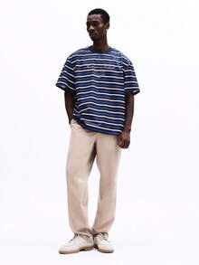 SUMWON Jummon Club New York International Studios Oversized Striped Short Sleeve T-Shirt With Crew Neckline And Embroidered Text Logo For Casual Summer Spring Everyday Wear - Blue - View 3