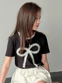 DAZY Camiseta de manga corta con cuello redondo, lazo decorativo y tejido para niñas preadolescentes, otoño - Negro - Ver 3