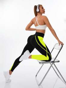 Exploreva Quần legging thể thao nữ thời trang cạp cao có túi, phối màu tương phản. - màu xanh lá - Xem 3