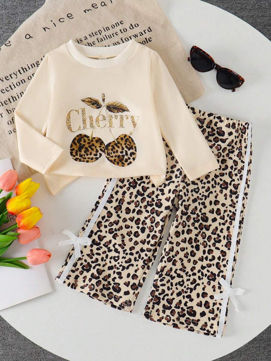 SHEIN 2pcs Girls Autumn/Winter Sweet & Cool Cherry Leopard Print Set, Cherry Print Long Sleeve Top + Leopard Print Flare Pants With Bow - Apricot - View 1