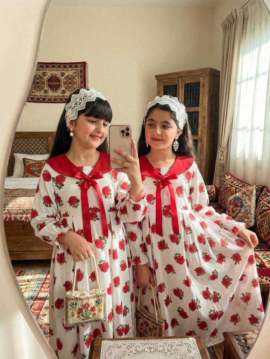 Este vestido midi con estampado floral rosa para niñas preadolescentes presenta un cuello de encaje y un gran lazo, en un estilo árabe/de Oriente Medio. Es adecuado para uso diario, vacaciones y otras ocasiones. - Rojo - Ver 1