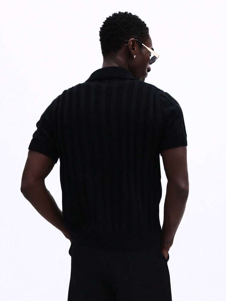 Polo-Shirt mit Viertelreißverschluss und Rippstrickkragen
