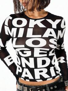 SUMWON WOMEN Long Sleeve Mesh Insert Graphic Typography Top With Bold Letter Print And Sheer Sleeves - Black - View 1