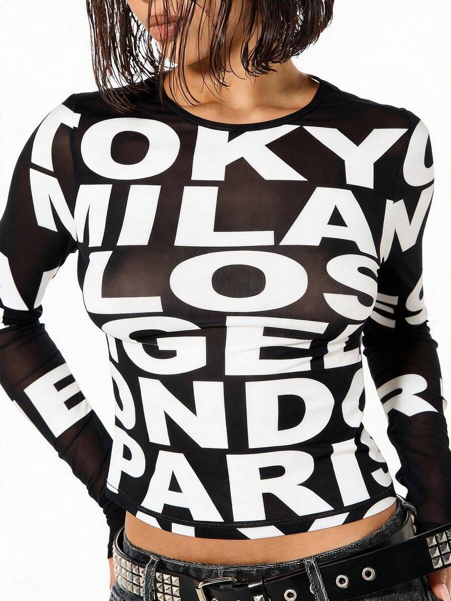SUMWON WOMEN Long Sleeve Mesh Insert Graphic Typography Top With Bold Letter Print And Sheer Sleeves - Black - View 1