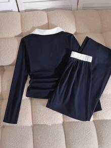 Sparklyn Bộ đồ thể thao đa năng 2 món dành cho thanh thiếu niên, gồm áo dài tay có cổ thêu nơ và quần ống rộng cạp chun cùng màu, thoải mái và thời trang cho mặc hàng ngày và tập luyện thể thao. - Màu xanh hải quân - Xem 2