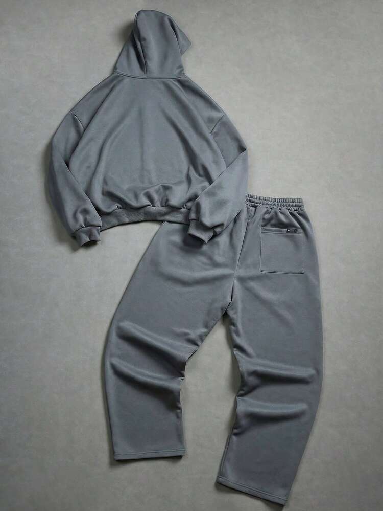 Completo felpa con cappuccio oversize e pantaloni della tuta con coulisse