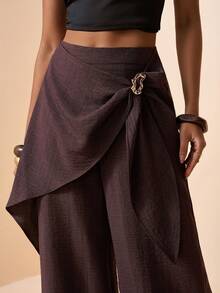 Zivah Lễ hội âm nhạc Xuân/Hè 2026, Lễ Phục Sinh, Ngày Thánh Patrick, Ngày Valentine, Hẹn hò, Phong cách miền Tây, Phong cách du mục, Tiệc sinh nhật, Lễ tốt nghiệp, Đại học, Sinh viên, Mặc hàng ngày, Phối đồ dễ dàng, Thường ngày, Kỳ nghỉ, Du thuyền, Bãi biển, Tắm nắng, Xu hướng thịnh hành, Thời trang đường phố, Khách dự đám cưới, Phong cách Boho, Đi làm, Ăn sáng muộn, Sân bay, Tiệc tùng, Đi chơi ngày lễ, Trang phục công sở. Quần ống loe nữ màu nâu chất liệu vải lanh, có dây buộc eo, ống quần hai lớp rộng rãi, có túi. - màu nâu - Xem 9