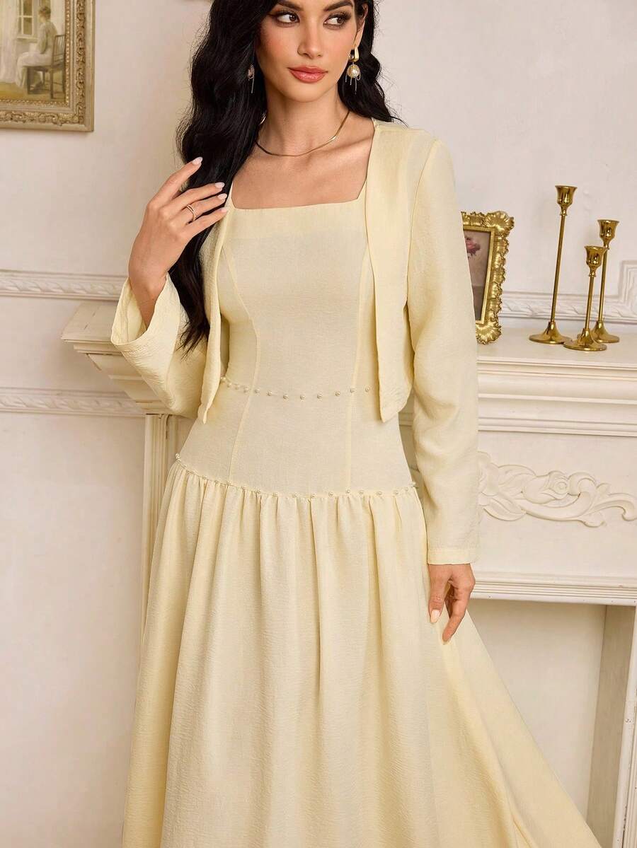 Modelyn Bộ váy và áo khoác dài tay màu trơn đính ngọc trai giả dành cho nữ, kiểu dáng xếp ly, thời trang cho kỳ nghỉ và du lịch. - Vàng nhạt - Xem 1