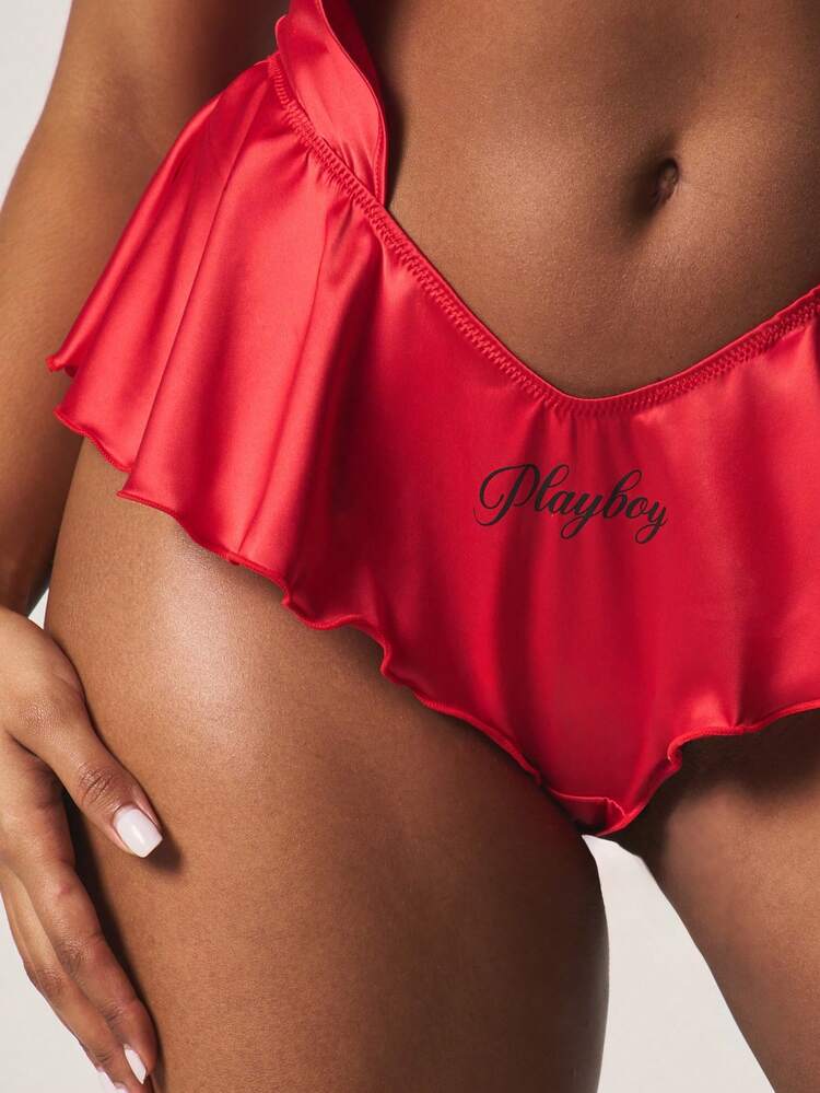 Missguided x Playboy Combinaison satinée avec nœud devant, short à volants. Vêtements de détente et d'intérieur pour la Saint-Valentin