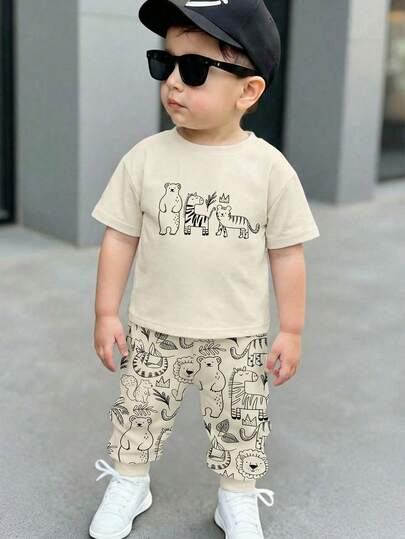 SHEIN 2 st/set babypojkar casual löst och bekvämt kortärmat t-shirt och byxor, lämpligt för vår/sommar, klassiska söta tryck av zebra, tiger, brunbjörn, lejon, ekorre, flodhäst, elefant tecknade djurmönster