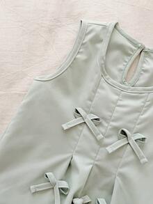 SHEIN Bộ đồ thể thao cho bé gái màu hồng và xanh lá cây trơn, kiểu dáng tối giản với nơ 3D trang trí, gồm áo không tay và quần dài, thích hợp mặc hàng ngày và đi nghỉ mát, mùa xuân/hè. - màu xanh lá - Xem 5