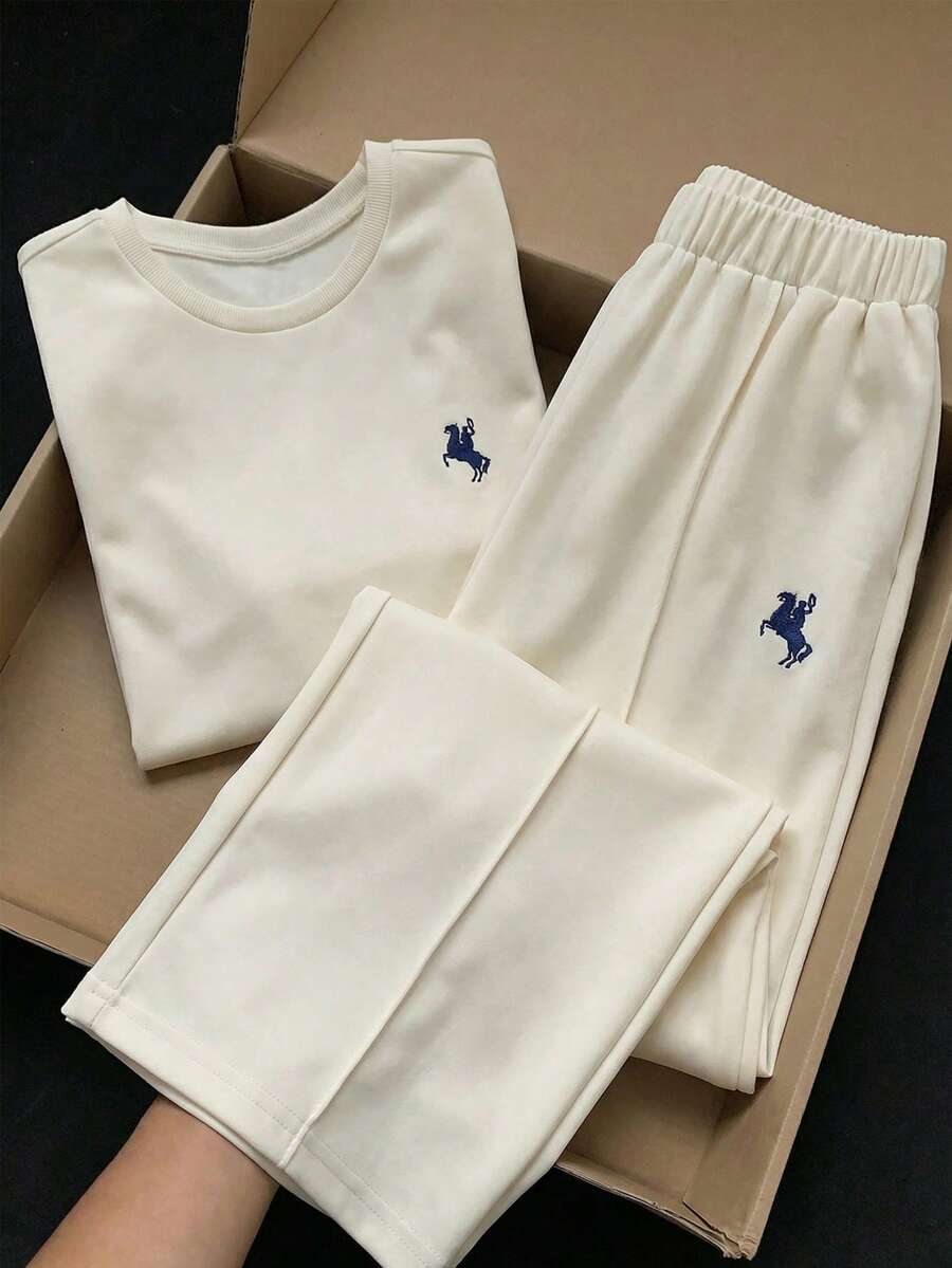 SHEIN 2pcs Tween Girls Casual Sports Set, Loose Embroidered Short Sleeve Top + Long Pants, Versatile For Daily, Home, School Wear - Apricot - View 1