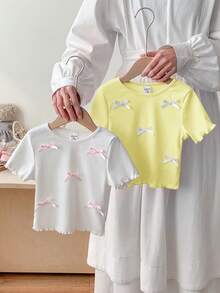 SHEIN LMoss Kids 2pcs/Set Baby Girl Cute Bow Knit Short Sleeve Top, Versatile Summer For Cute Tops Baby Tops Baby Tees Baby Doll Shirts Baby T Shirts - White - View 1