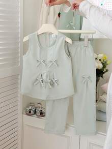 SHEIN Bộ đồ thể thao cho bé gái màu hồng và xanh lá cây trơn, kiểu dáng tối giản với nơ 3D trang trí, gồm áo không tay và quần dài, thích hợp mặc hàng ngày và đi nghỉ mát, mùa xuân/hè. - màu xanh lá - Xem 10