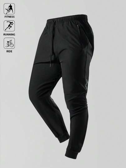 Manfinity 男友风男士抽绳腰拉链口袋运动裤，男士慢跑裤，轻便健身裤秋季透气