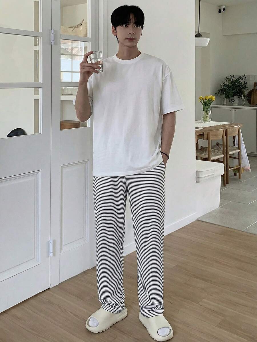 DAZY Bộ đồ ngủ nam ngắn tay gồm áo thun và quần dài, thích hợp cho mùa hè. - Nhiều màu - Xem 1