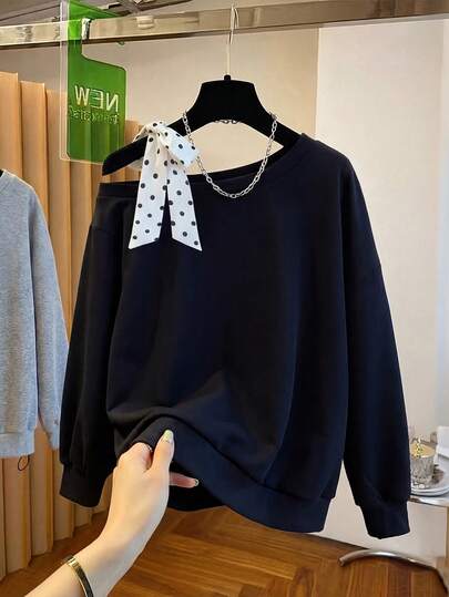 SHEIN Franclia 女士斜肩不规则领波点领结黑色宽松卫衣，舒适休闲，时尚优雅，适合日常穿着、婚礼、宴会、通勤、毕业派对、节日活动、度假等场合。撞色设计，天鹅绒面料。