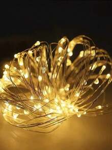 这是一款LED仙女主题氛围灯，采用铜线制成，并带有星光设计。适用于卧室、闪烁灯饰、梅森罐灯、DIY派对、圣诞节、聚会、婚礼、餐桌布置、装饰和情人节装饰。 - 彩色 - 查看 7