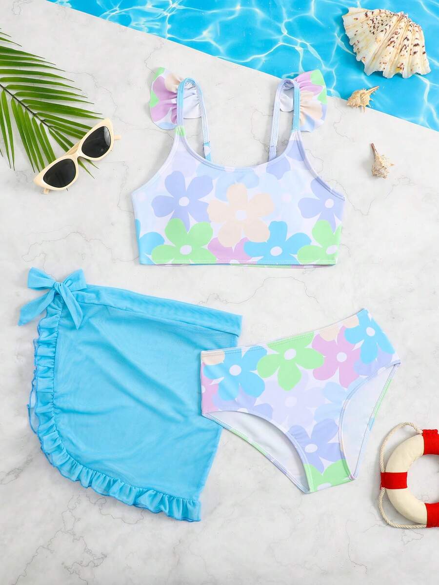 SHEIN 女童连体泳衣套装,浅蓝色撞色花卉图案,采用弹力速干面料,亲肤舒适。三件套包括吊带泳衣、三角泳裤和网纱罩裙。清新花卉风格,舒适透气,适合女孩游泳、夏季海滩度假、泳池玩耍,时尚休闲。 - 淺藍色 - 查看 1