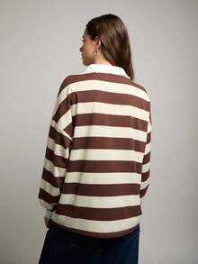 Nöista 宽松条纹长袖T恤。采用醒目的横条纹设计，配有领子和纽扣门襟，并饰有荷叶边细节。宽松休闲版型，适合春夏穿着。 - 杏色 - 查看 2